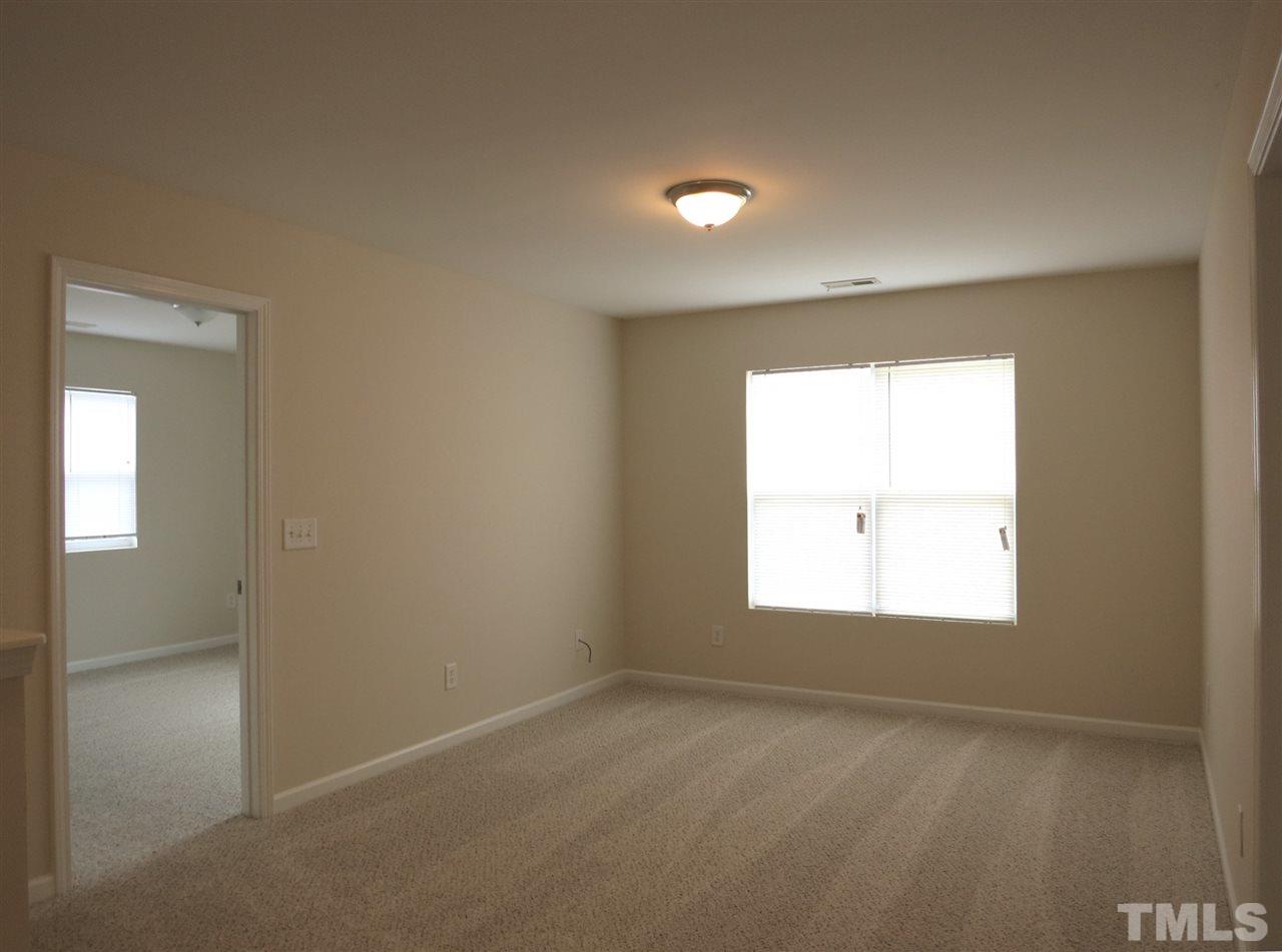 6714 Harter Court Raleigh, NC 27610 - Photo 13 of 25 All the Bedrooms (and Laundry Rm & Bath) are off the spacious Loft w/neutral carpet.