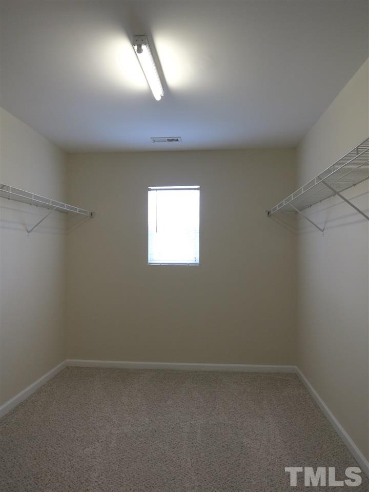 6714 Harter Court Raleigh, NC 27610 - Photo 22 of 25 The Master Bedroom's WIC is huge!