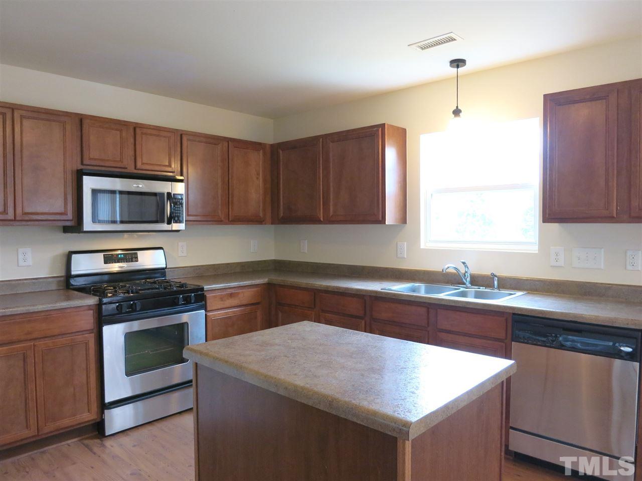 6714 Harter Court Raleigh, NC 27610 - Photo 7 of 25 Another view of the spacious Kitchen.
