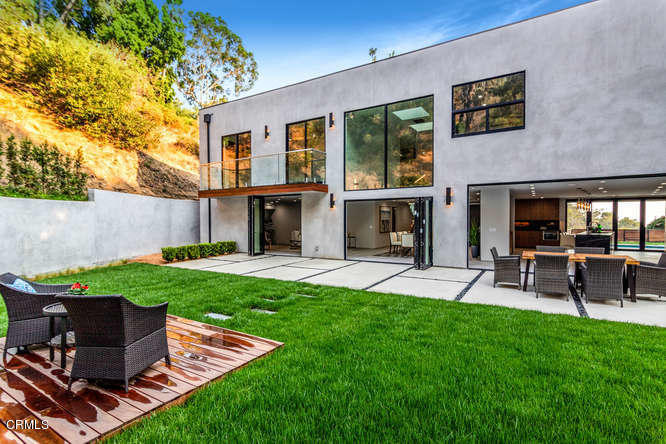 1375 Wierfield Drive Pasadena, CA 91105 - Photo 20 of 68 a view of a house with a yard and sitting area