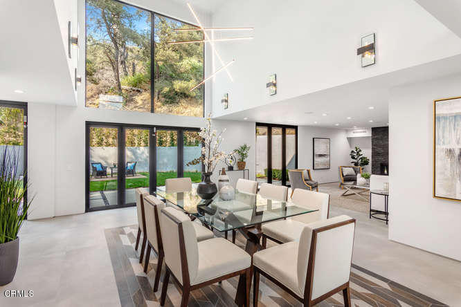 1375 Wierfield Drive Pasadena, CA 91105 - Photo 21 of 68 a view of a dining room with furniture window and outside view