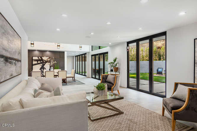 1375 Wierfield Drive Pasadena, CA 91105 - Photo 29 of 68 a living room with furniture and floor to ceiling window