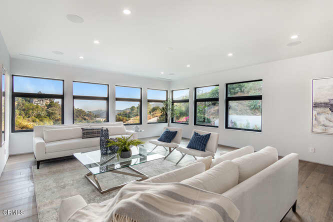 1375 Wierfield Drive Pasadena, CA 91105 - Photo 45 of 68 a living room with furniture and large windows