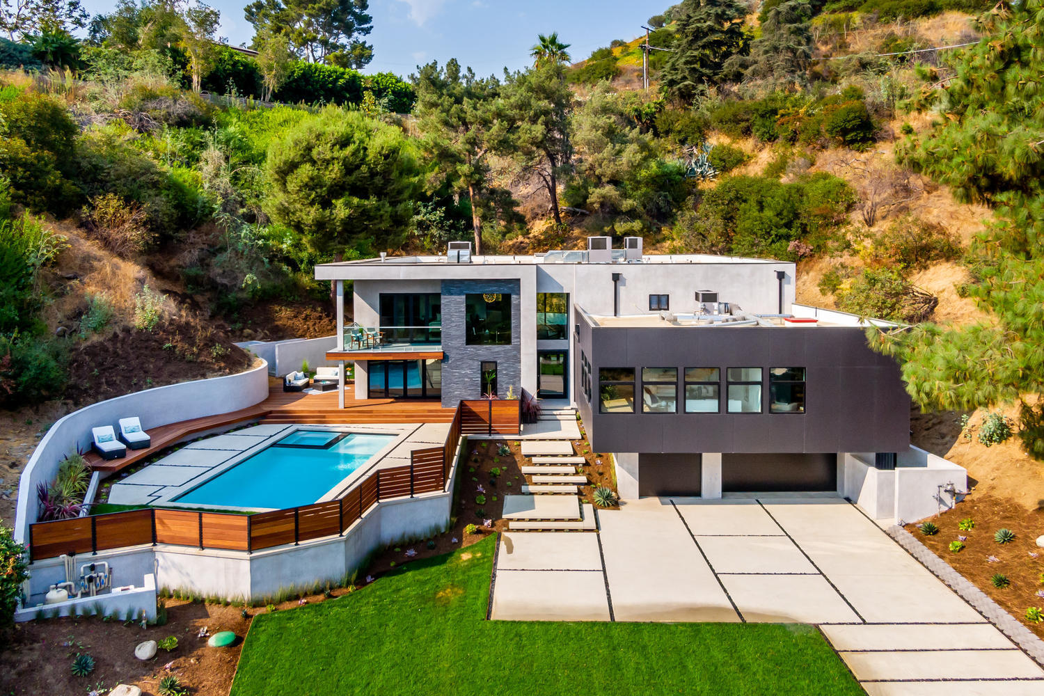 1375 Wierfield Drive Pasadena, CA 91105 - Photo 6 of 68 an aerial view of a house with swimming pool and large trees