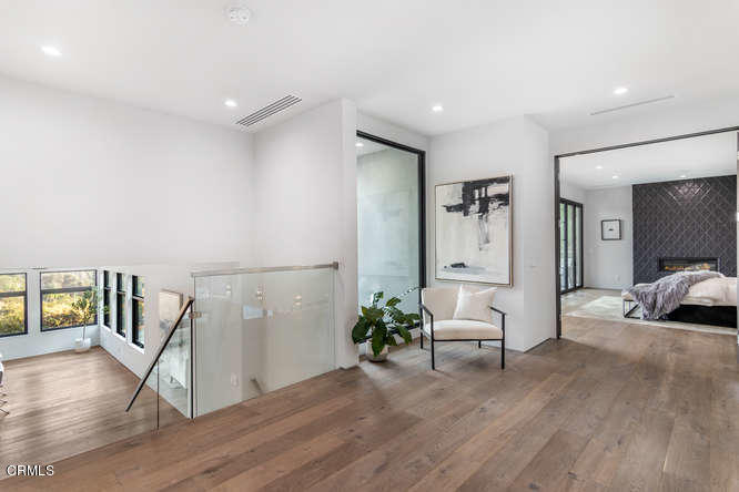 1375 Wierfield Drive Pasadena, CA 91105 - Photo 51 of 68 a living room with furniture and a wooden floor