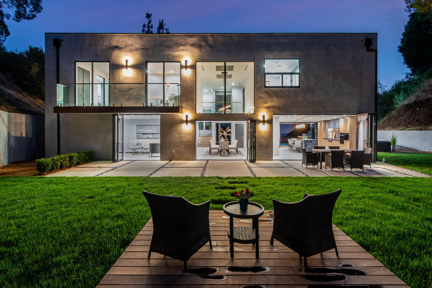 1375 Wierfield Drive Pasadena, CA 91105 - Photo 8 of 68 a view of a chair and table in backyard of the house