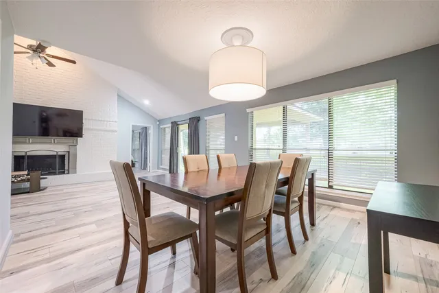 a view of a livingroom with furniture and windows