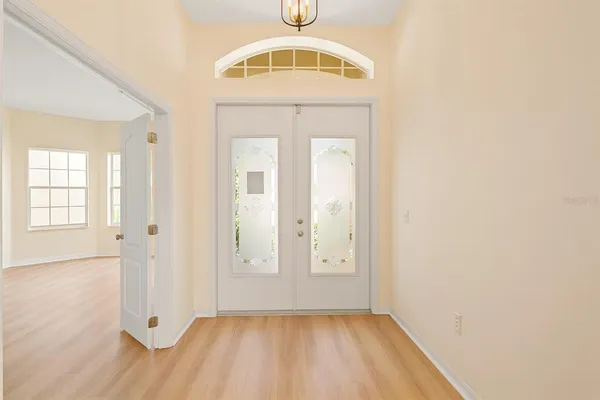 a view of a room with a chandelier