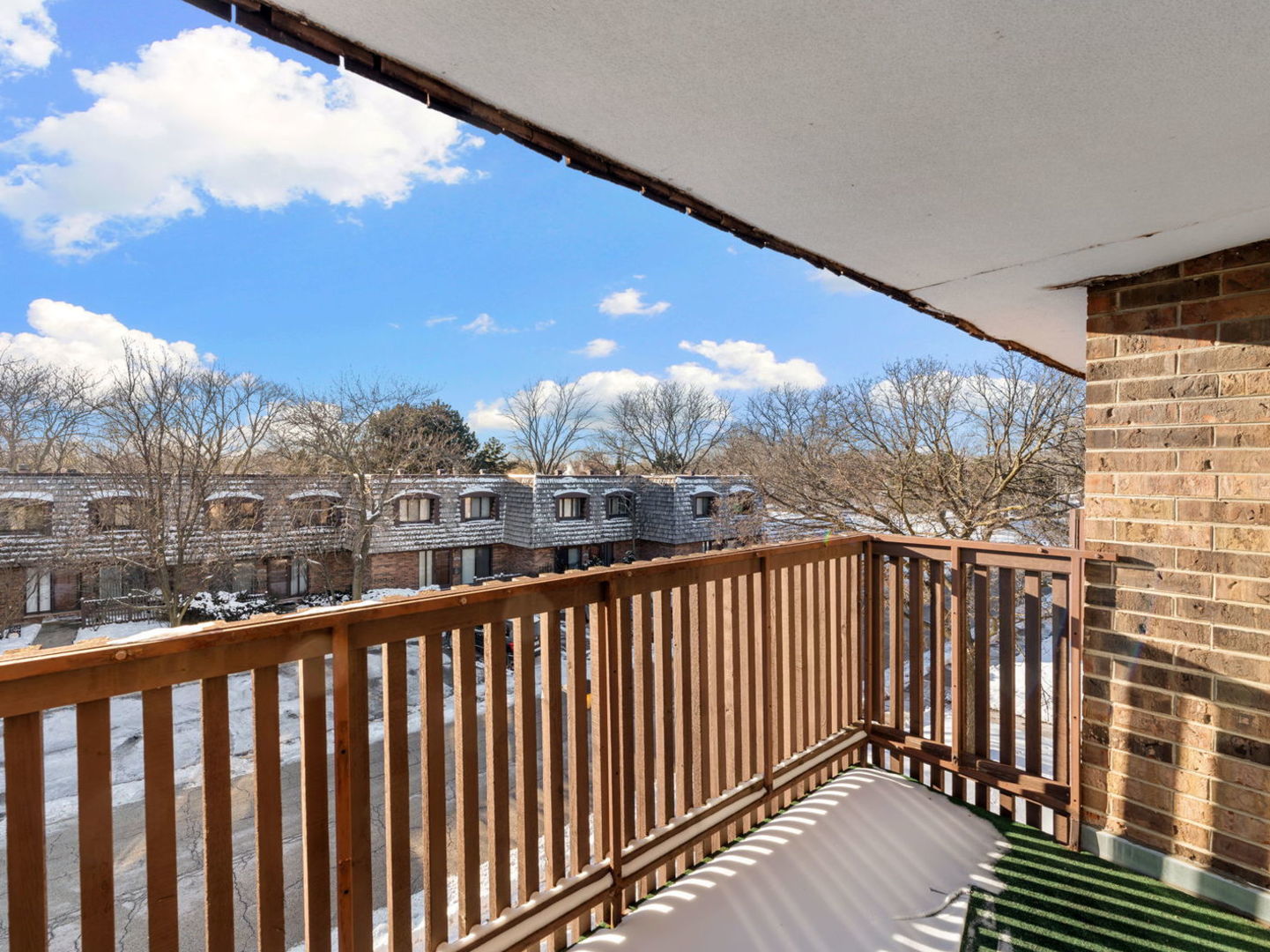 925 Spring Hill Drive, Unit 302 Northbrook, IL 60062 - Photo 16 of 24 a view of city from a balcony