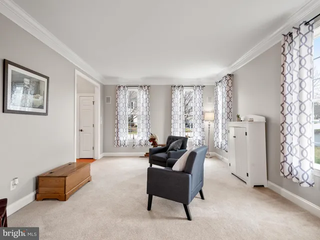 a workspace with furniture and window