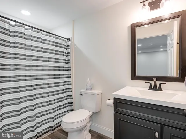 a view of a kitchen with dining area barbeque oven and a fountain