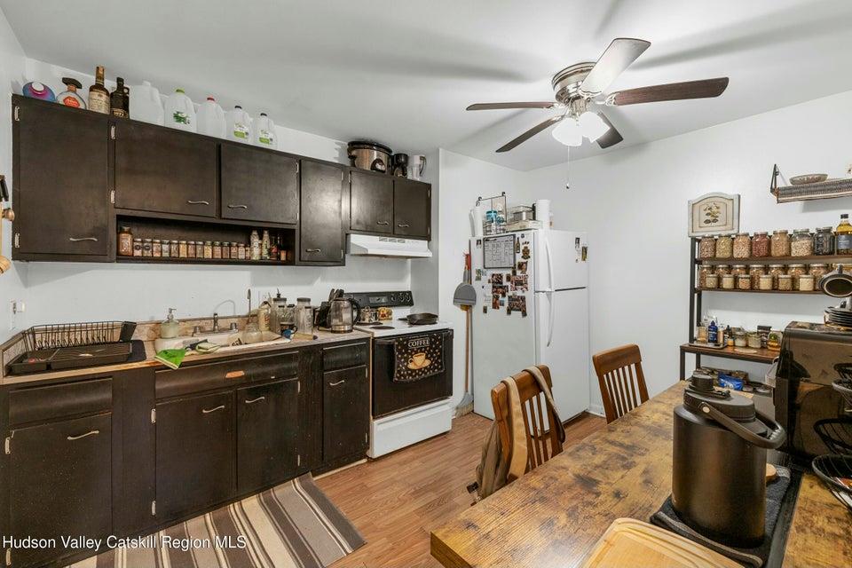 236 State Rte 32 South New Paltz, NY 12561 - Photo 7 of 11 a kitchen with stainless steel appliances granite countertop a sink stove and refrigerator