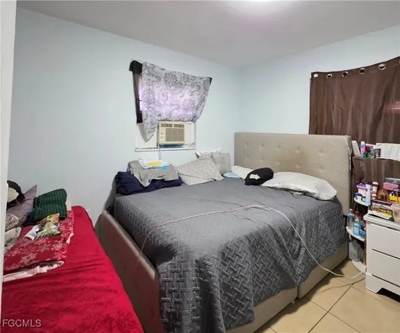 a bathroom with a sink toilet and mirror