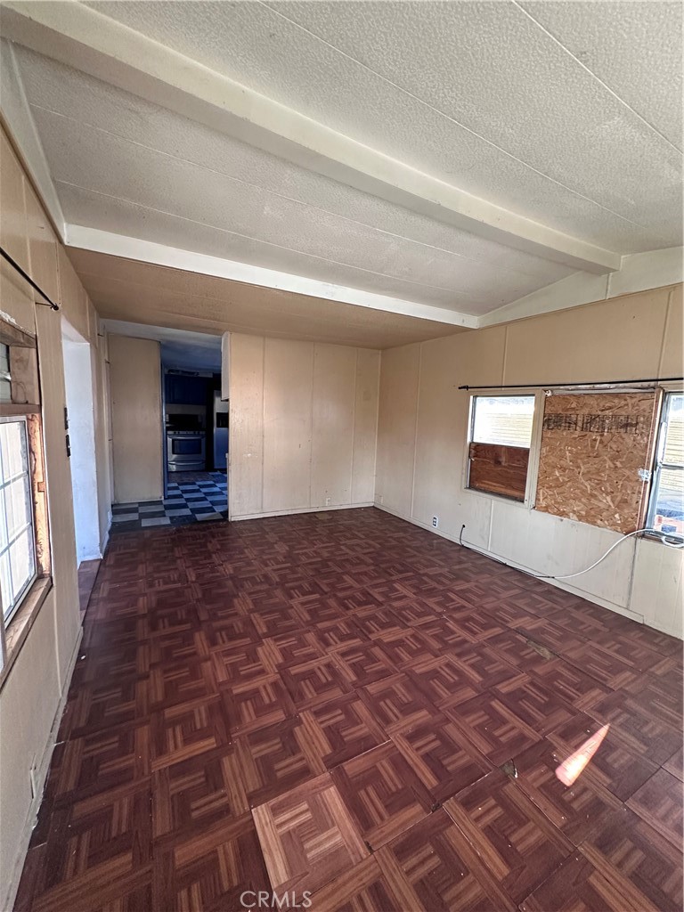 258 West 7th Street, Unit 51 San Jacinto, CA 92583 - Photo 14 of 14 a bedroom with a bed and a window