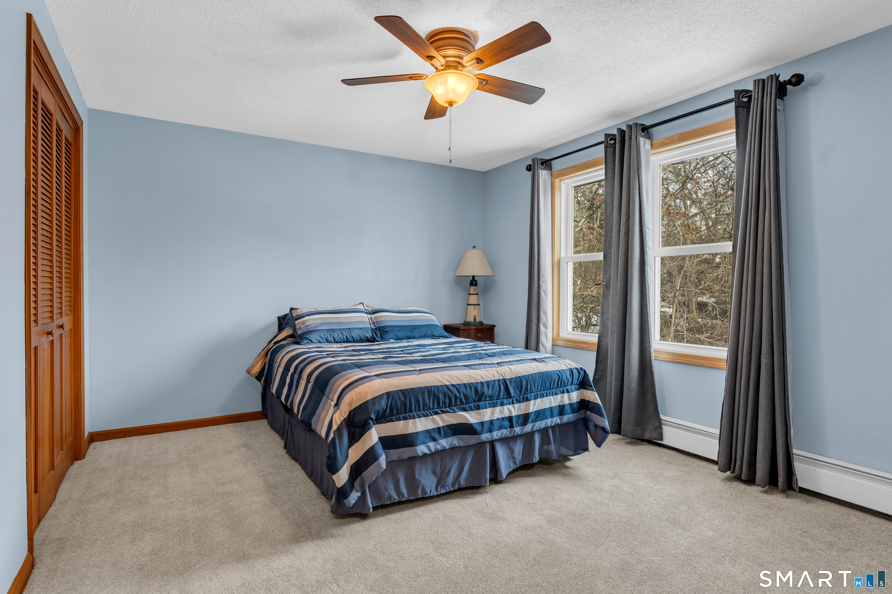 26 Pent Road Branford, CT 06405 - Photo 17 of 28 a bedroom with a bed and a window