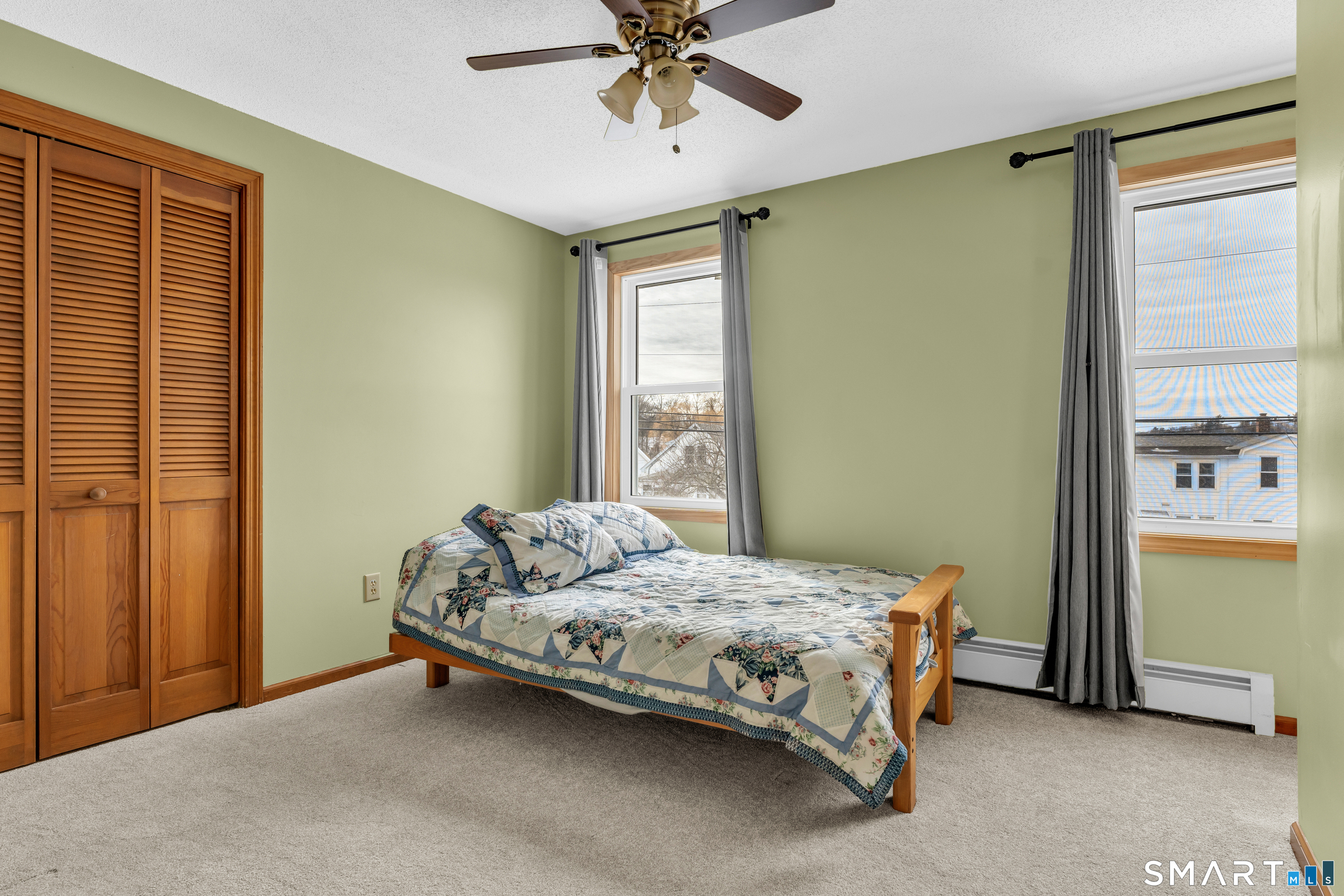26 Pent Road Branford, CT 06405 - Photo 21 of 28 a bedroom with a bed and a window