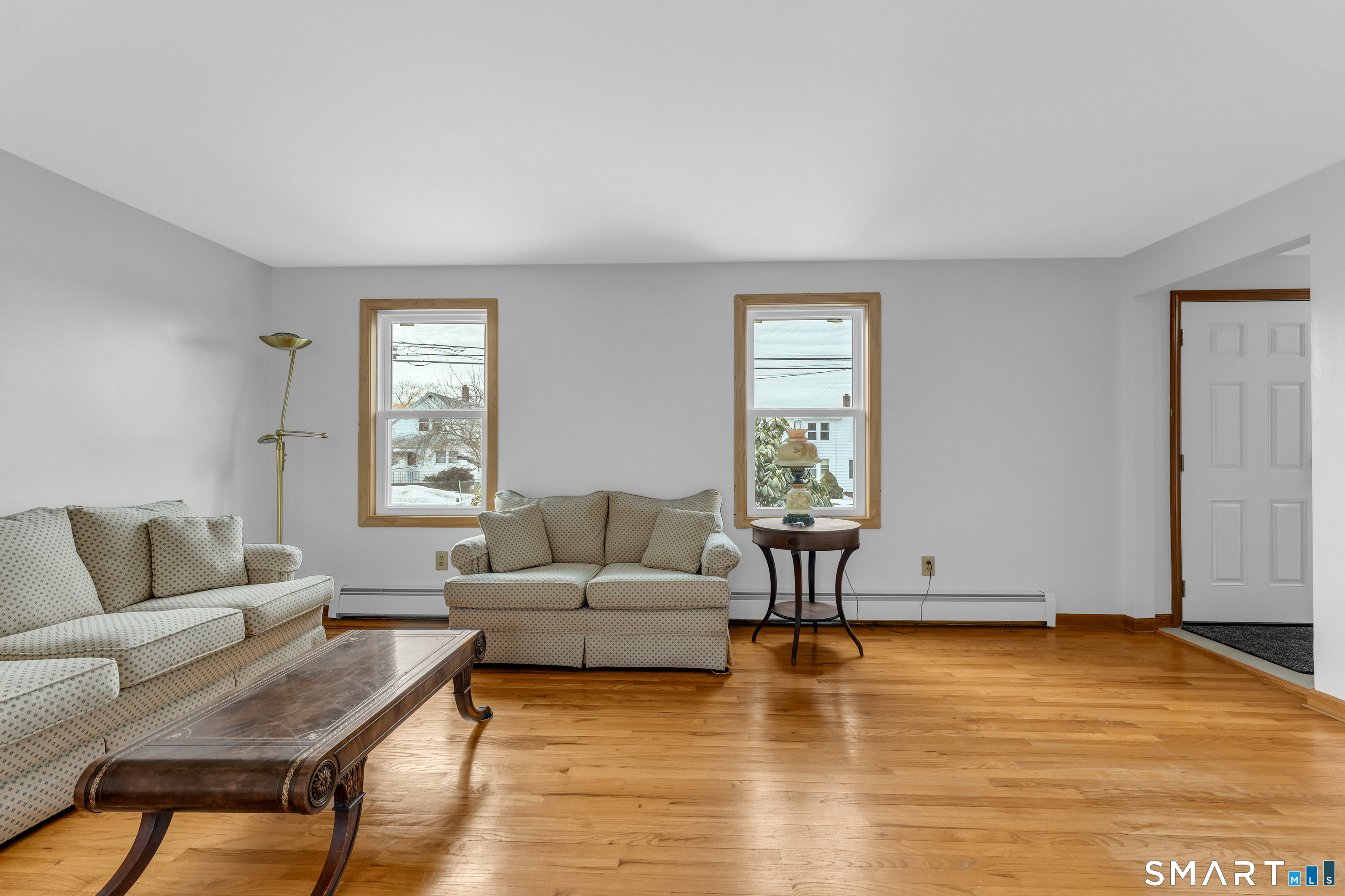 26 Pent Road Branford, CT 06405 - Photo 25 of 28 a living room with furniture and a window
