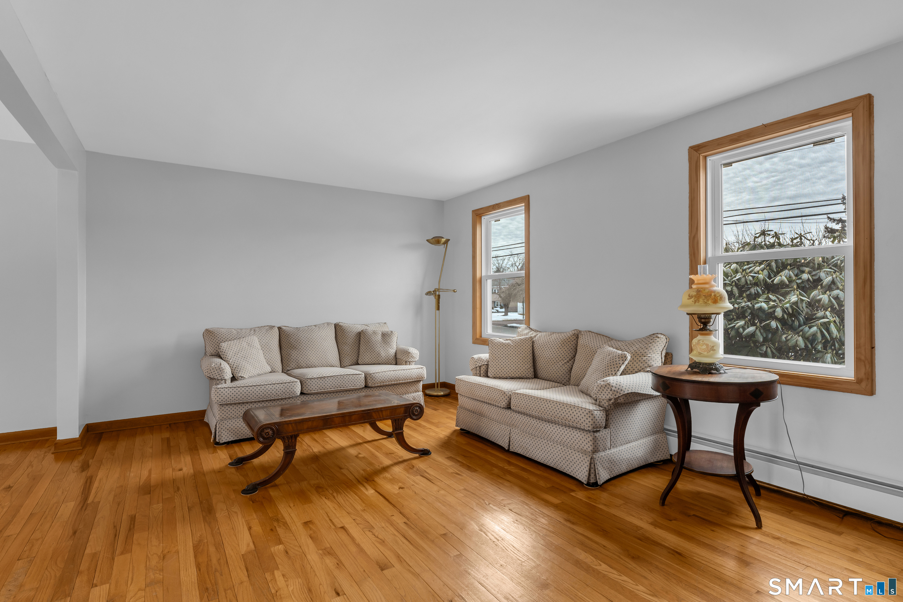 26 Pent Road Branford, CT 06405 - Photo 4 of 28 a living room with furniture and a wooden floor