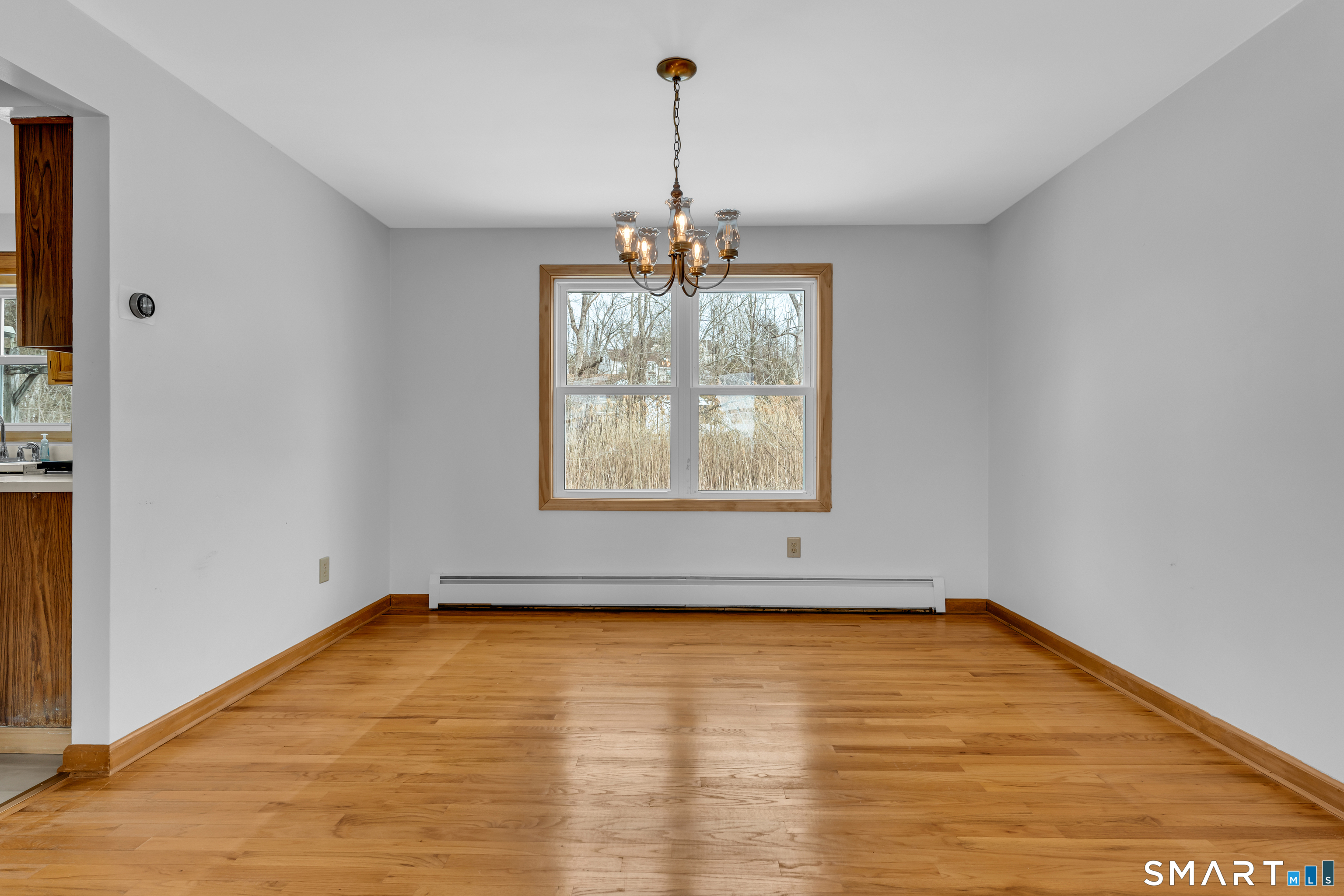 26 Pent Road Branford, CT 06405 - Photo 5 of 28 wooden floor in an empty room with a window