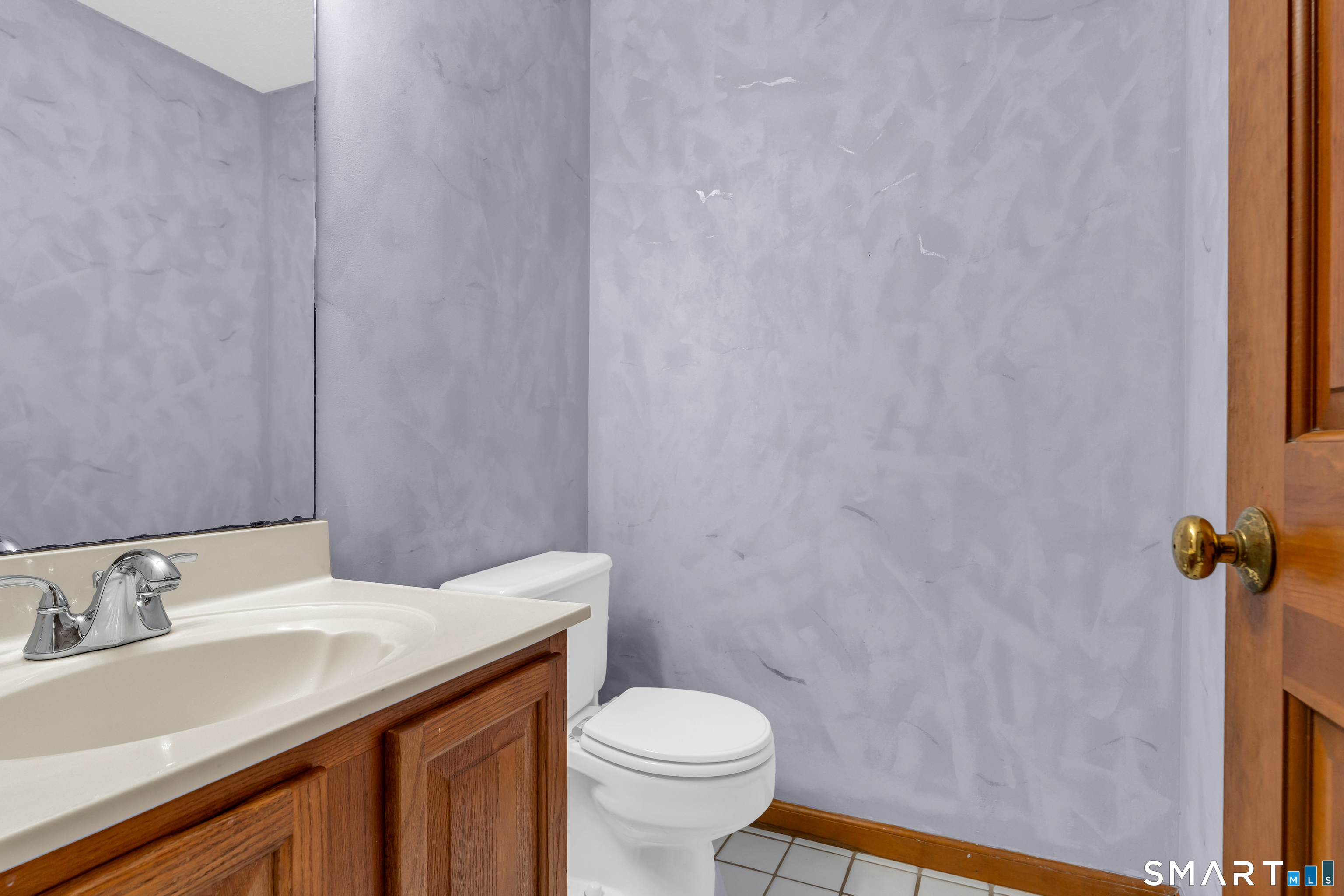 26 Pent Road Branford, CT 06405 - Photo 10 of 28 a bathroom with a sink and a toilet