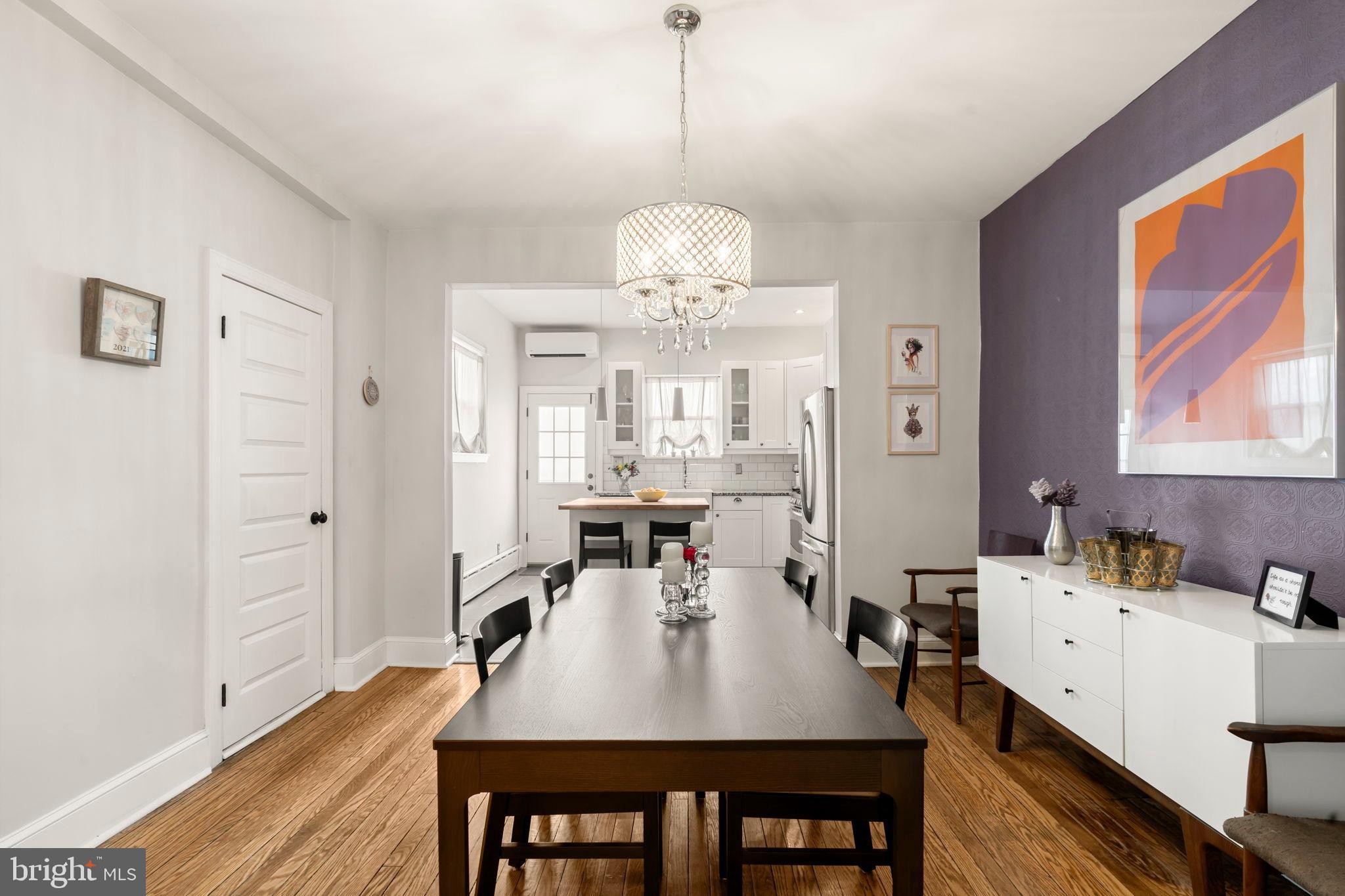 1728 South 13th Street Philadelphia, PA 19148 - Photo 13 of 31 a view of a dining room with furniture window and wooden floor