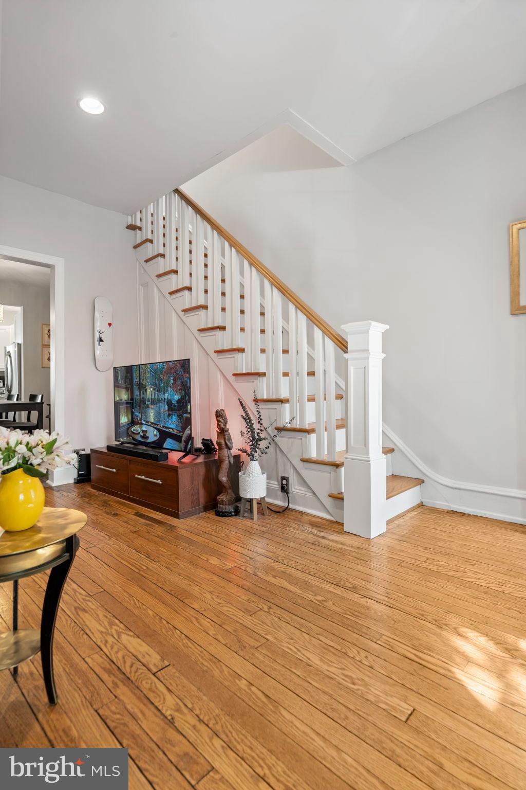 1728 South 13th Street Philadelphia, PA 19148 - Photo 19 of 31 a view of a livingroom with furniture and an empty room