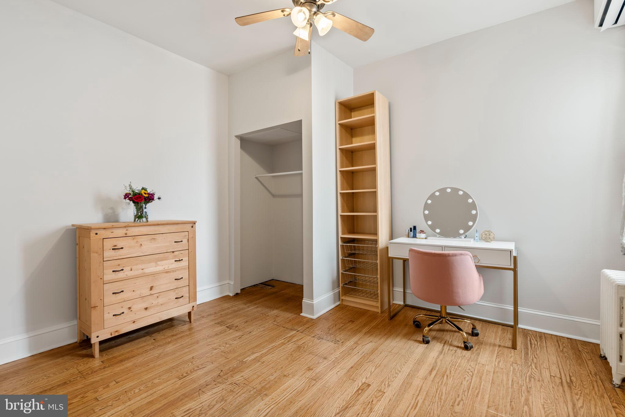 1728 South 13th Street Philadelphia, PA 19148 - Photo 23 of 31 a workspace with furniture and wooden floor
