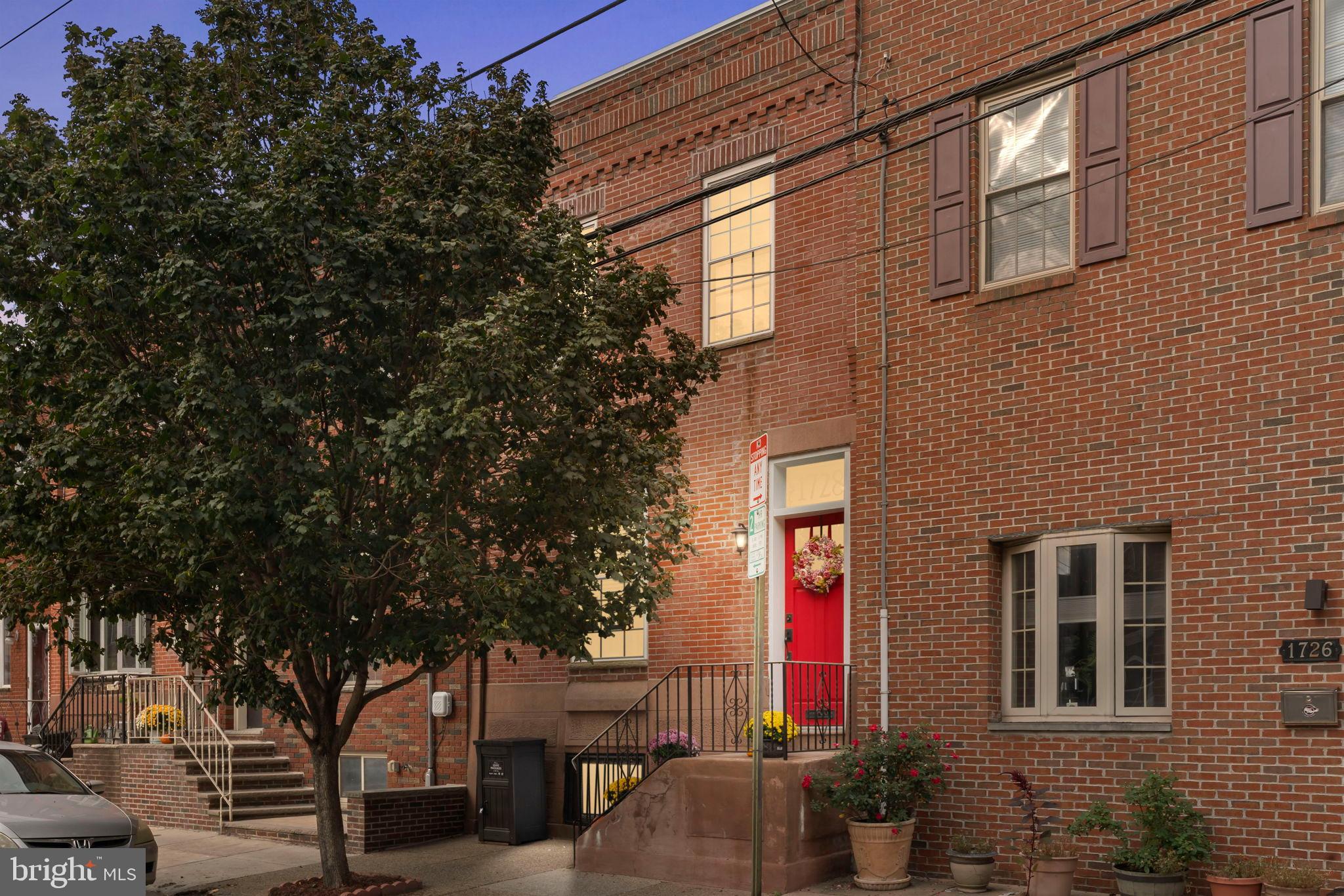 1728 South 13th Street Philadelphia, PA 19148 - Photo 31 of 31 a front view of a house with a tree