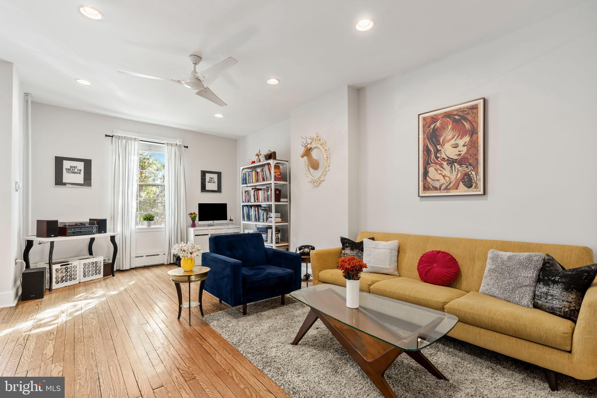 1728 South 13th Street Philadelphia, PA 19148 - Photo 5 of 31 a living room with furniture and a couch