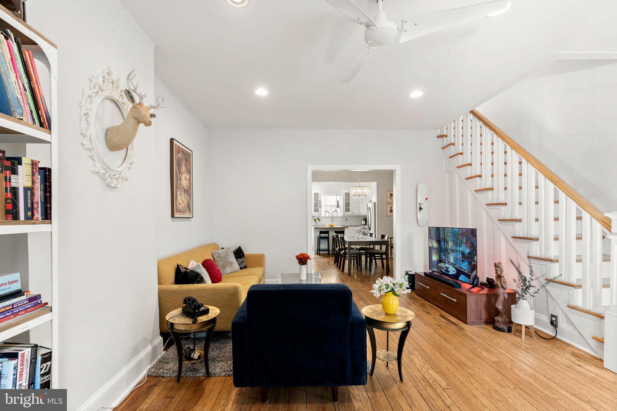 1728 South 13th Street Philadelphia, PA 19148 - Photo 7 of 31 a living room with furniture and a wooden floor
