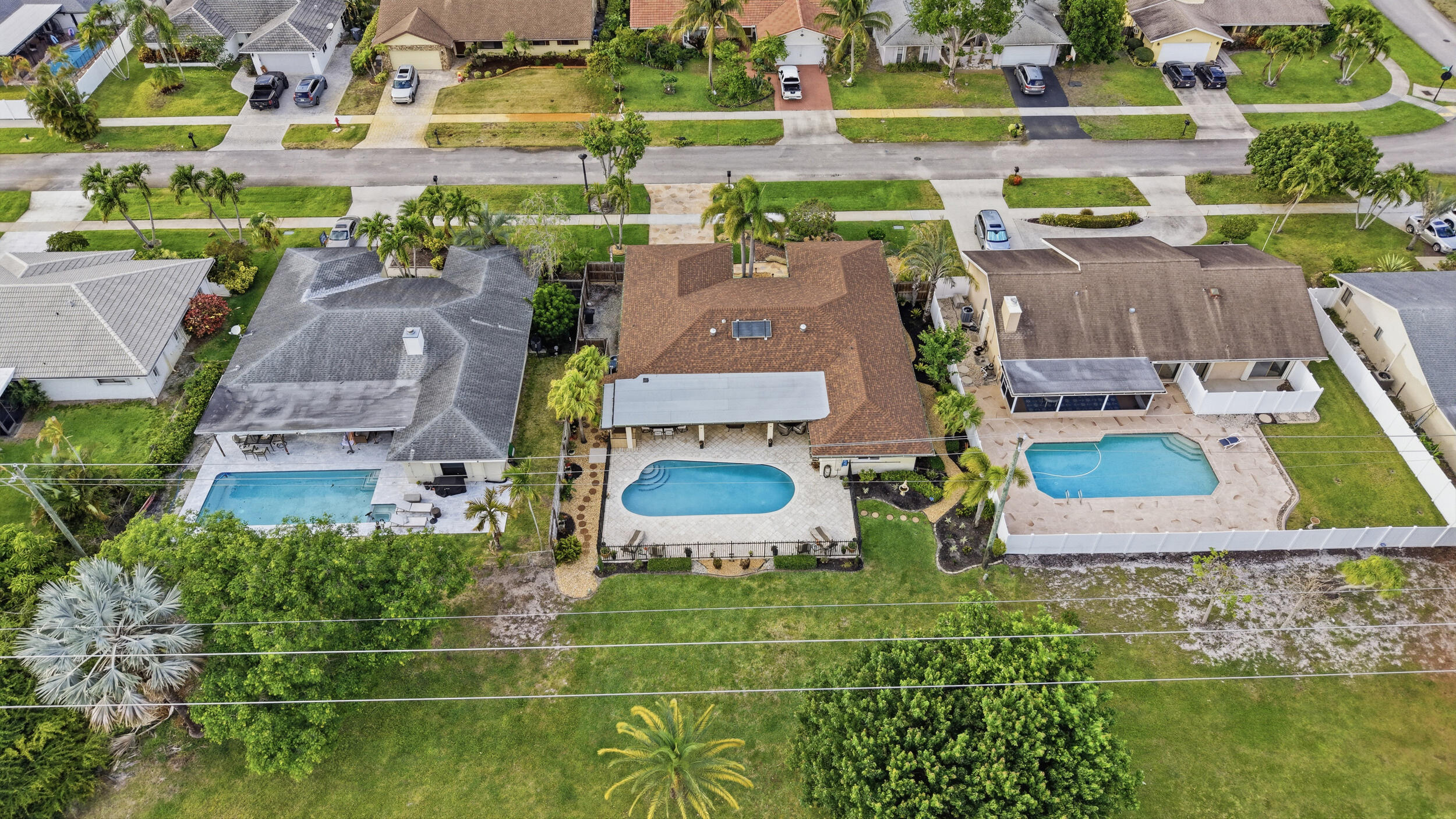 4780 Brandywine Drive Boca Raton, FL 33487 - Photo 41 of 43 an aerial view of residential houses with outdoor space and parking