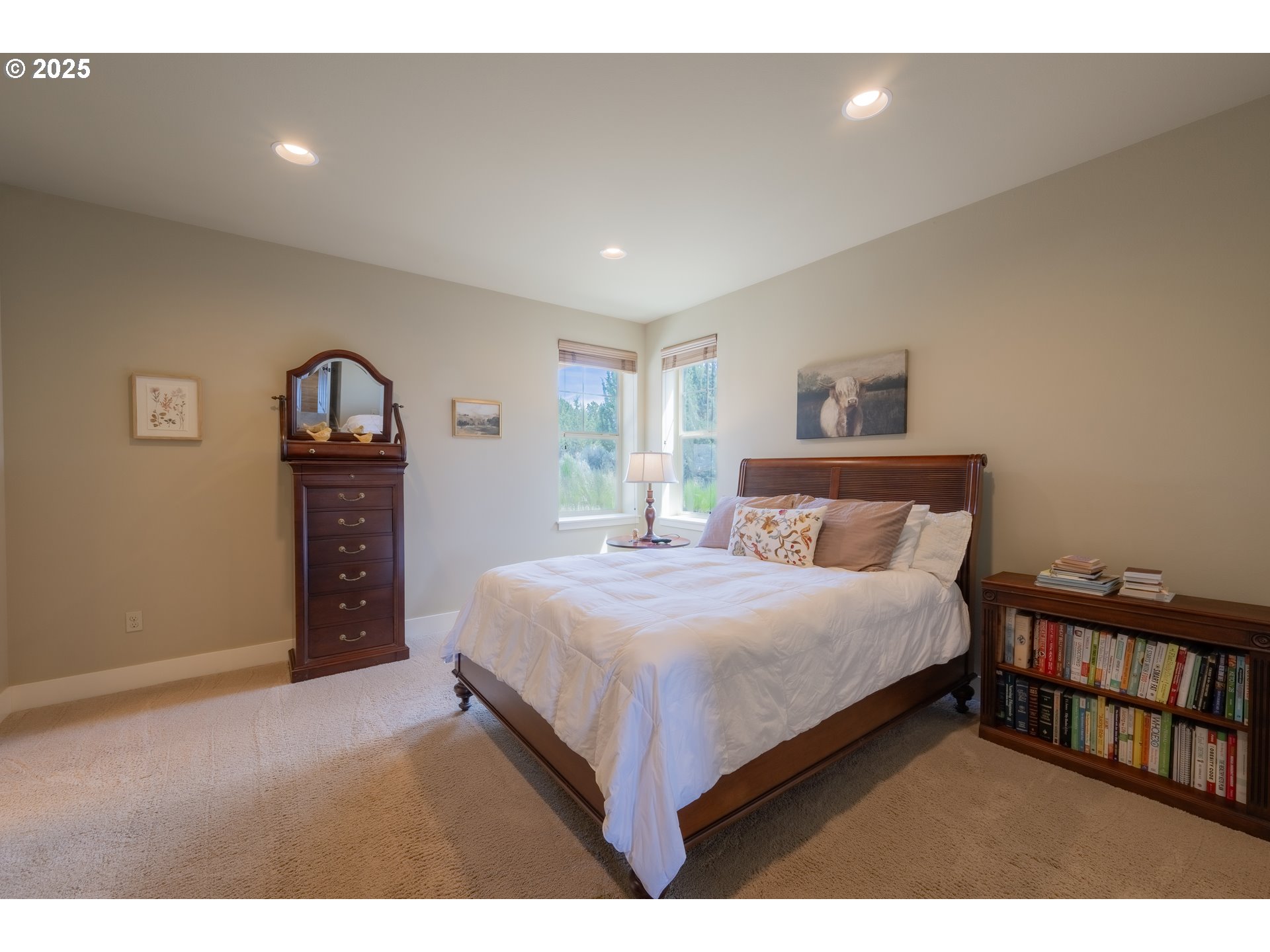 1202 Southeast Yarrow Avenue Madras, OR 97741 - Photo 2 of 16 a bedroom with a bed and a flat screen tv