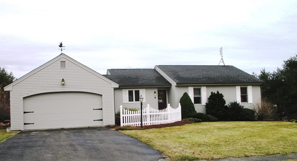 9 Sycamore Drive Rutland, MA 01543 - Photo 1 of 20 a front view of a house with a yard