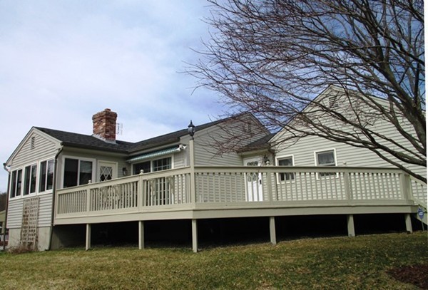 9 Sycamore Drive Rutland, MA 01543 - Photo 16 of 20 a front view of a house with a garden