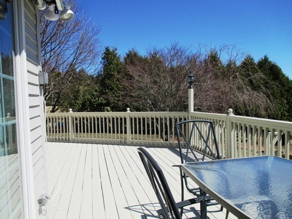 9 Sycamore Drive Rutland, MA 01543 - Photo 17 of 20 a balcony with wooden floor and outdoor space