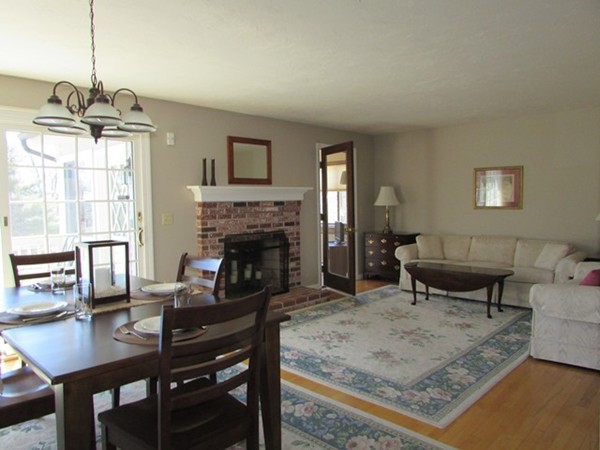 9 Sycamore Drive Rutland, MA 01543 - Photo 2 of 20 a living room with furniture and a fireplace