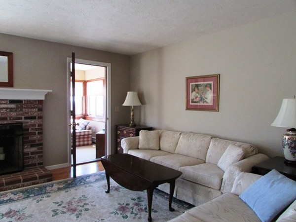 9 Sycamore Drive Rutland, MA 01543 - Photo 4 of 20 a living room with furniture and a fireplace