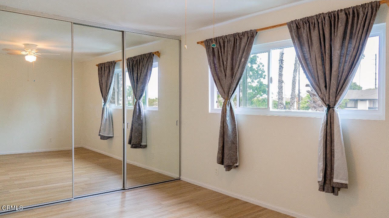 1920 North H Street, Unit 235 Oxnard, CA 93036 - Photo 4 of 13 a bathroom with a shower and a sink