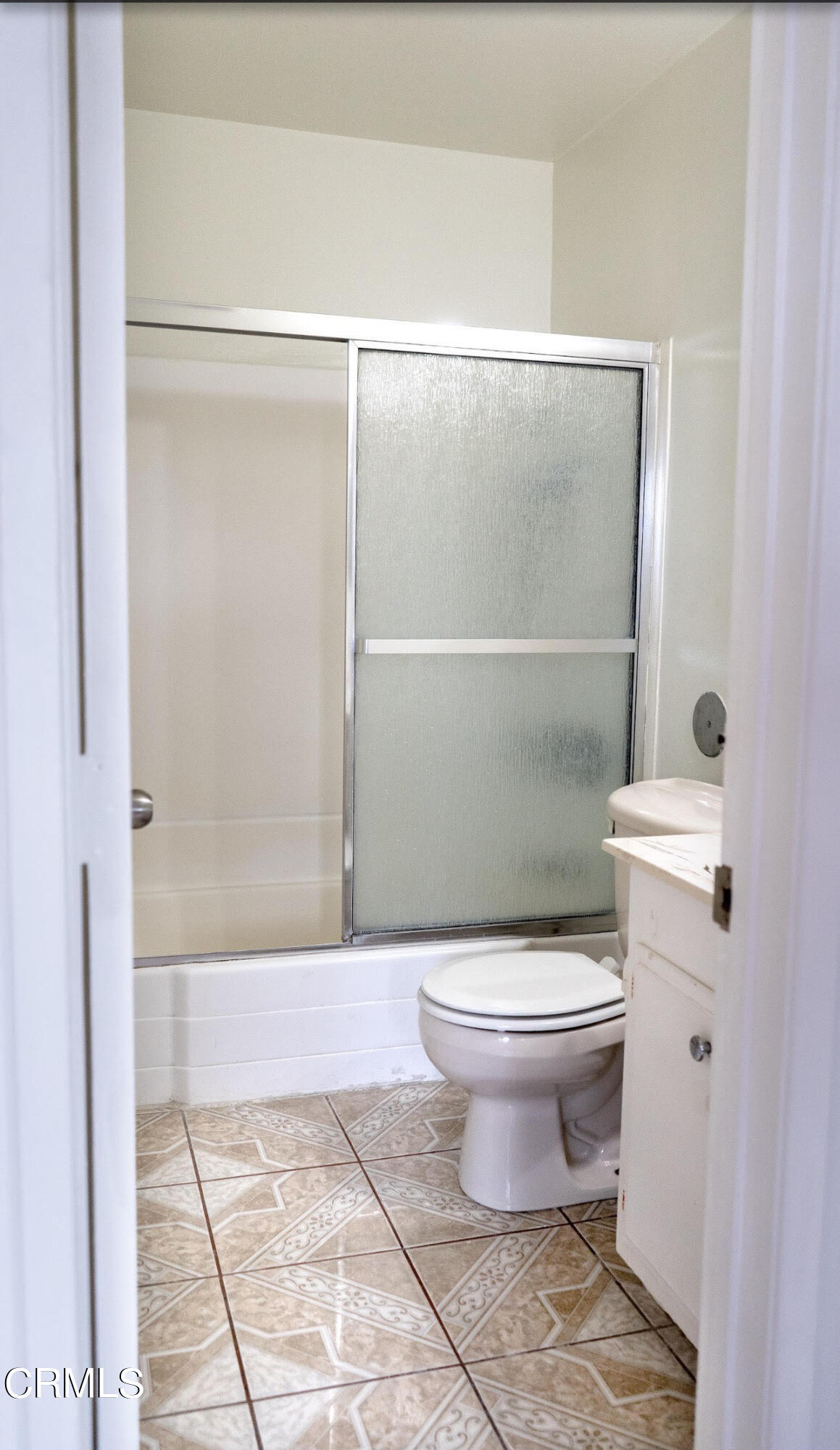 1920 North H Street, Unit 235 Oxnard, CA 93036 - Photo 6 of 13 a bathroom with a toilet and a shower