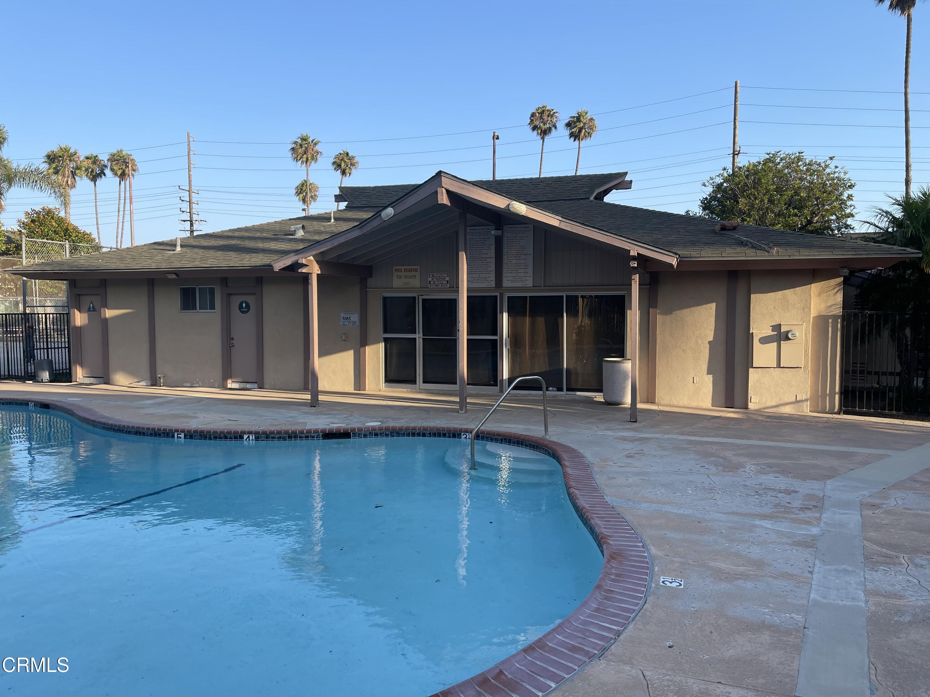1920 North H Street, Unit 235 Oxnard, CA 93036 - Photo 9 of 13 a view of a house with pool