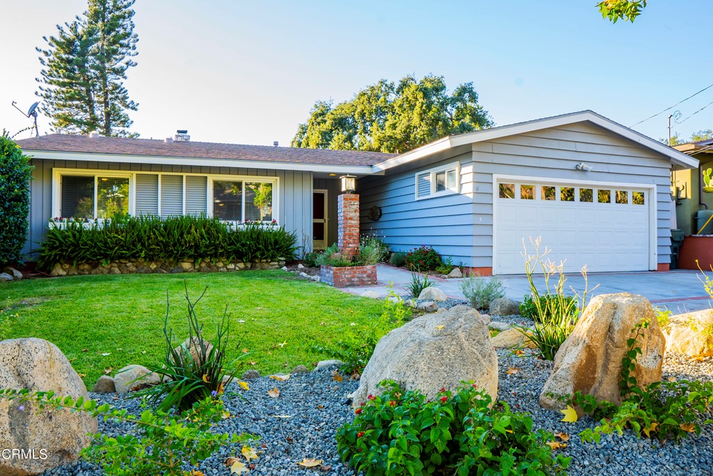4155 Aralia Road Altadena, CA 91001 - Photo 2 of 28 a front view of a house with garden
