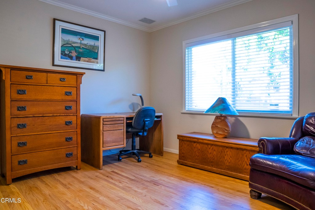 4155 Aralia Road Altadena, CA 91001 - Photo 15 of 28 a room with furniture and a window