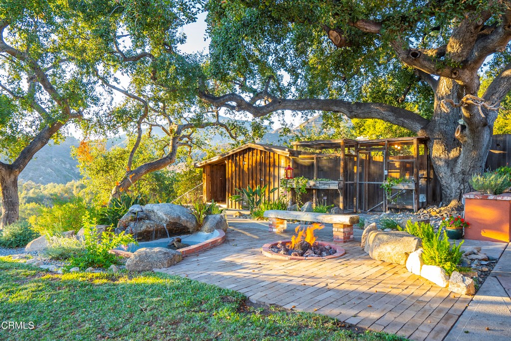 4155 Aralia Road Altadena, CA 91001 - Photo 16 of 28 a view of a park with couches and wooden fence