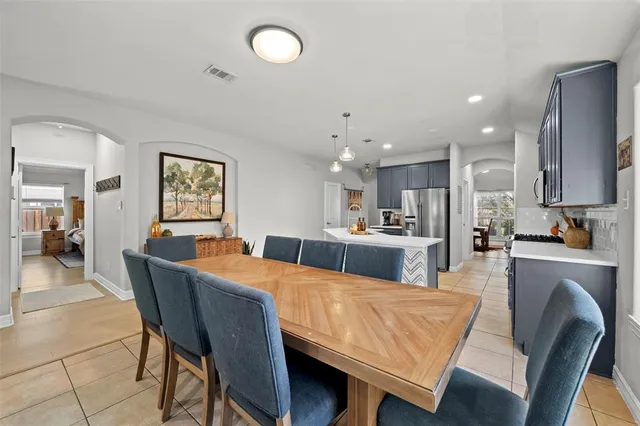 a living room with furniture fireplace and flat screen tv