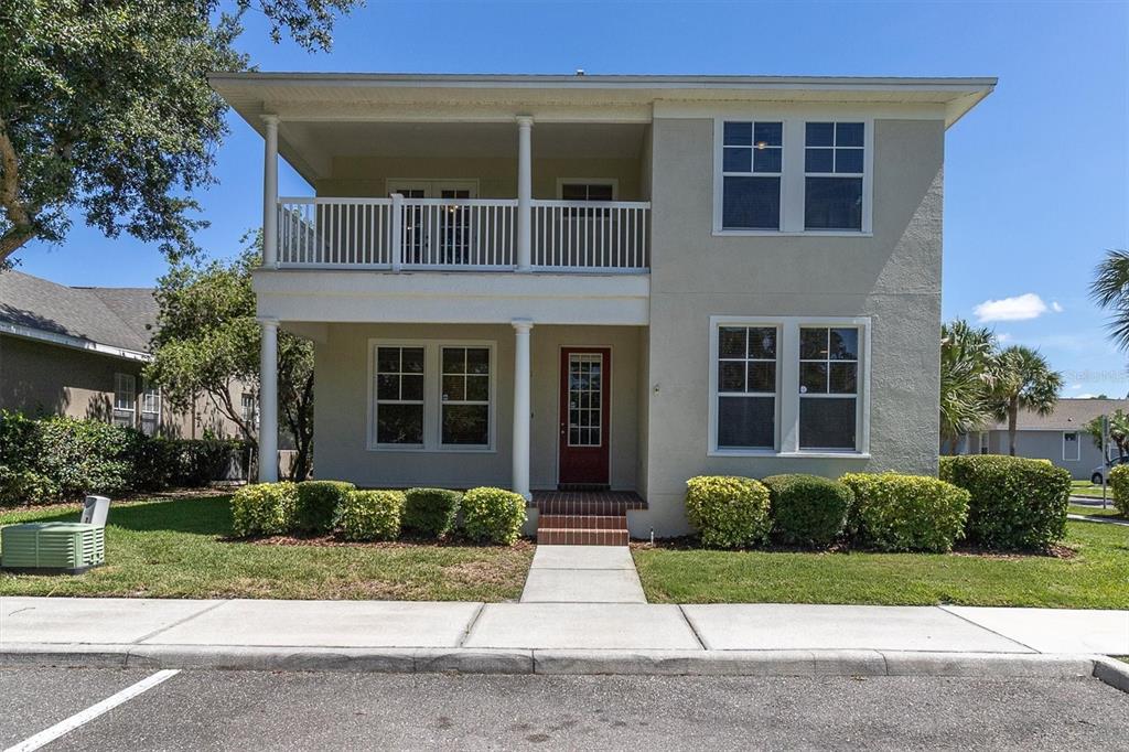 10121 Porch Street New Port Richey, FL 34655 - Photo 1 of 57 a front view of a house with a yard