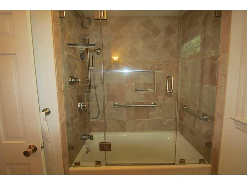4 Ridgewood Circle Kennebunk, ME 04043 - Photo 20 of 27 Bathroom. Stone surround in second...