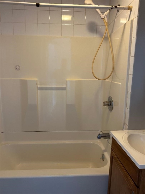 80 Cochran Street, Unit 3L Chicopee, MA 01020 - Photo 5 of 8 a bathroom with a bath tub with a shower