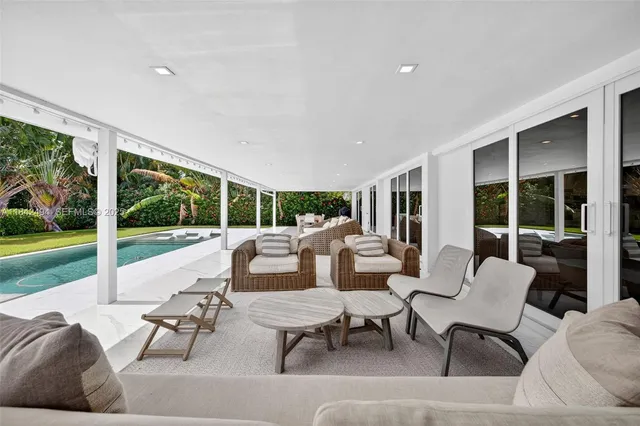 a outdoor living space with furniture and garden view