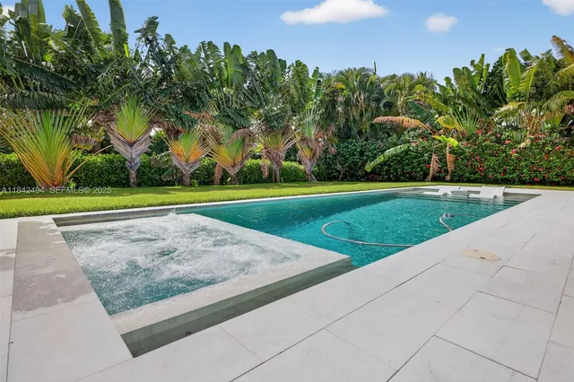 a view of a park with large trees