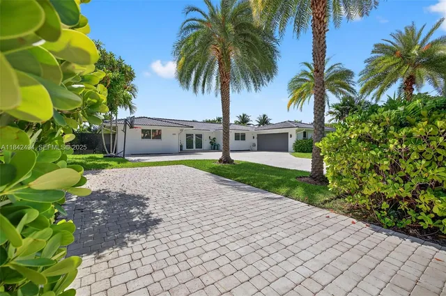a house with garden in front of it